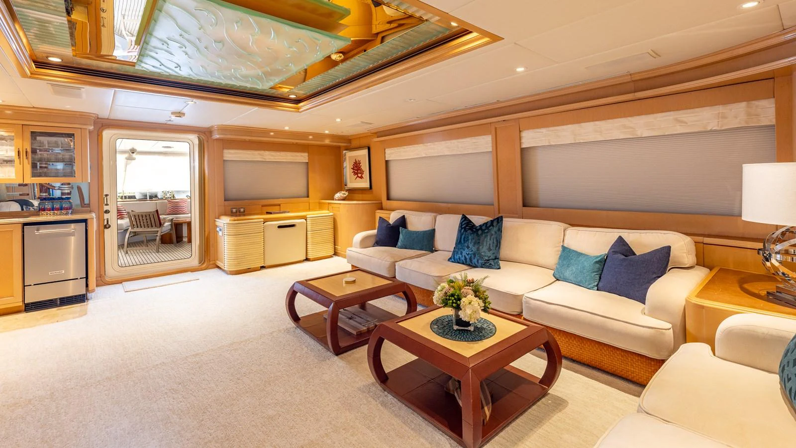 The salon offers a spacious and elegantly designed area with comfortable seating and tasteful decor. aboard BAD COMPANY Yacht for Sale
