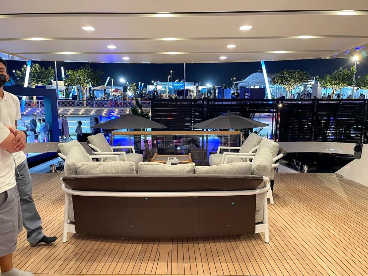The aft deck features a comfortable seating area with plush cushions, perfect for socializing and relaxing. aboard FOUZ Yacht for Sale