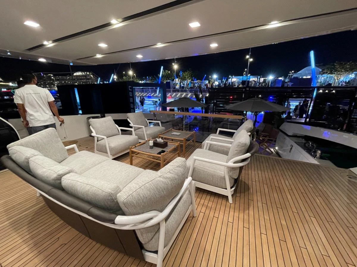 The aft deck features a comfortable seating area with modern furnishings, perfect for evening relaxation. aboard FOUZ Yacht for Sale