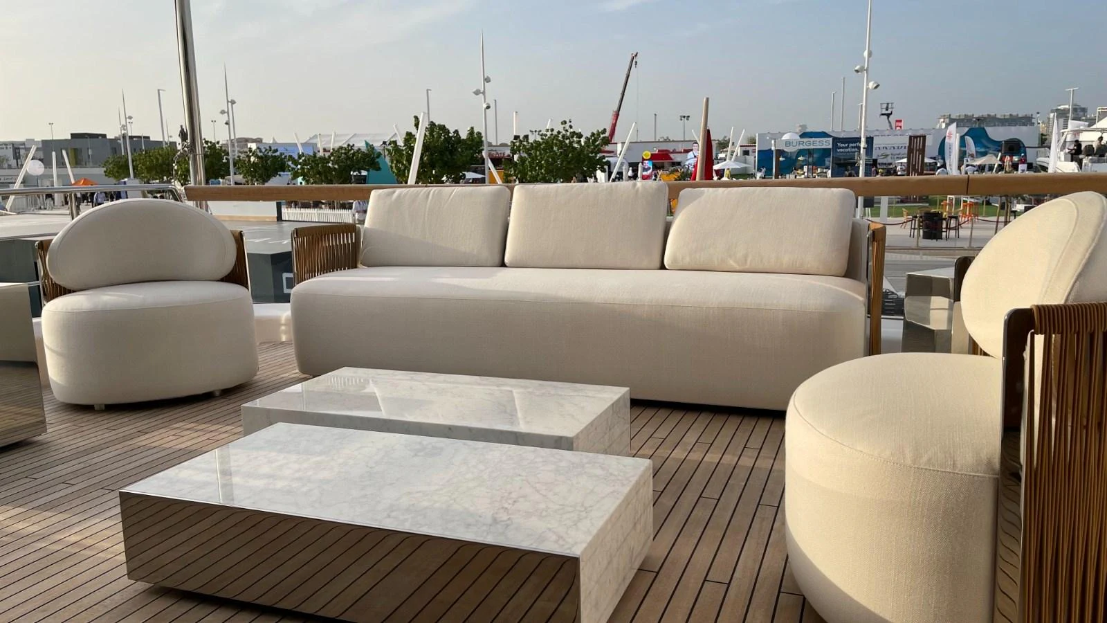The sundeck features luxurious, modern outdoor seating with plush cushions and sleek tables. aboard FOUZ Yacht for Sale