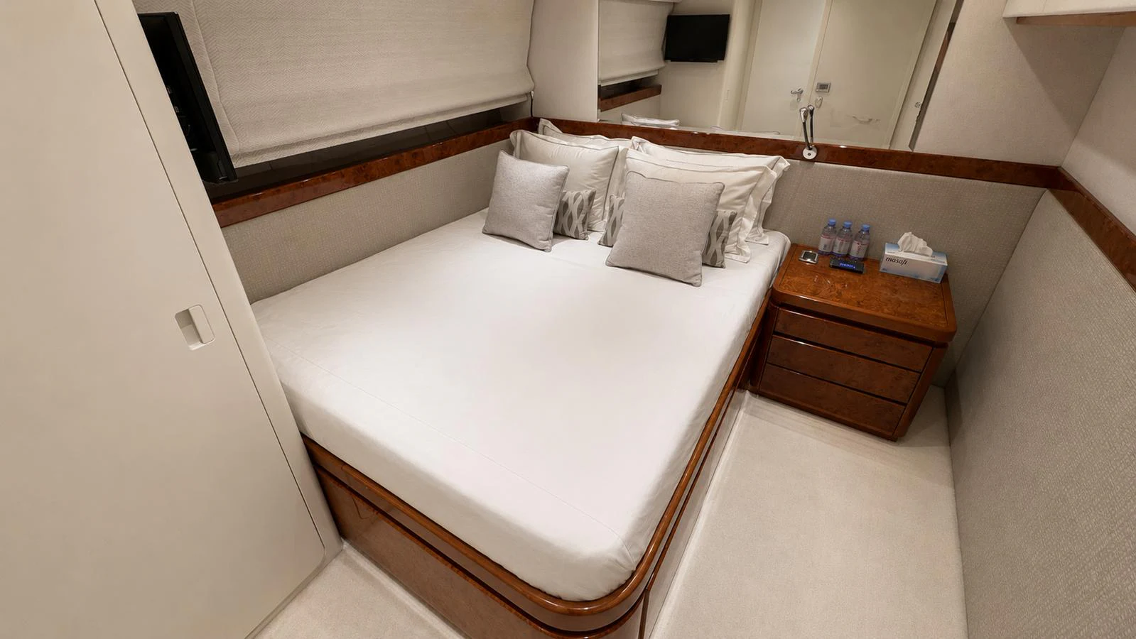 A cozy stateroom featuring a comfortable bed and elegant furnishings. aboard ALPHERATZ Yacht for Sale