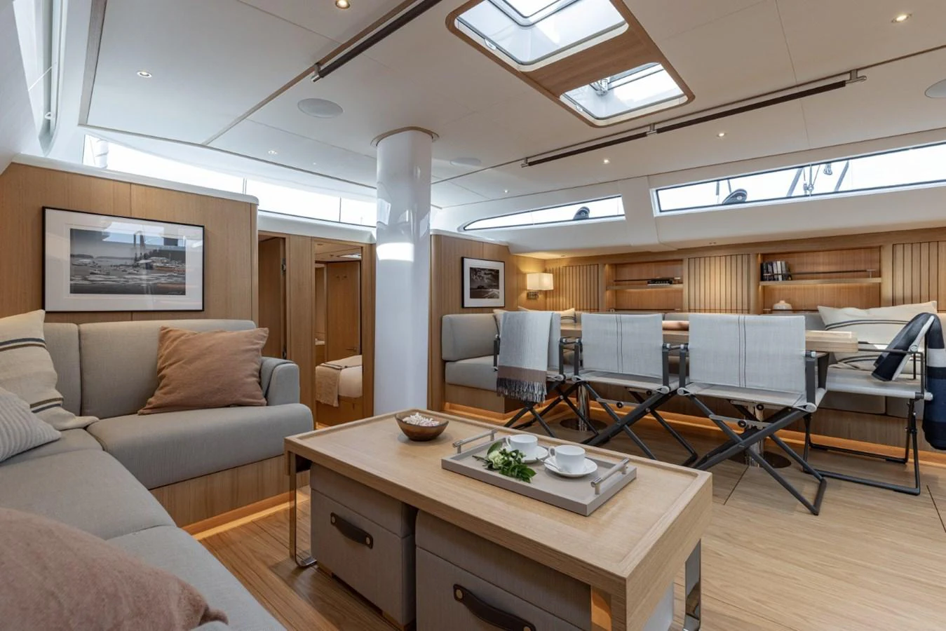 The yacht's salon features a spacious and inviting seating area with ample natural light. aboard DREAMCATCHER Yacht for Sale