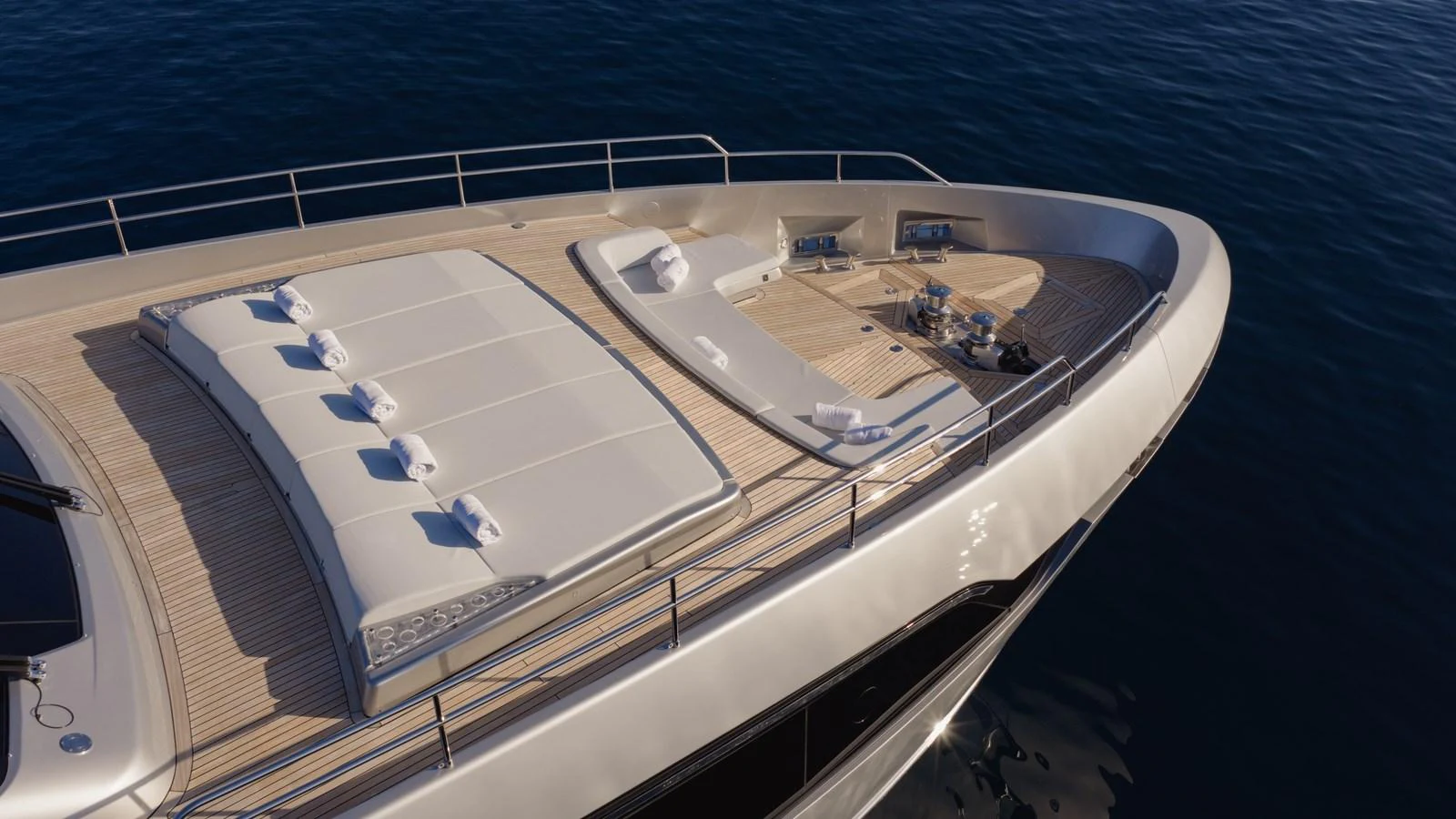 The yacht's foredeck features luxurious sun loungers and a spacious seating area, perfect for relaxation. aboard M Yacht for Sale