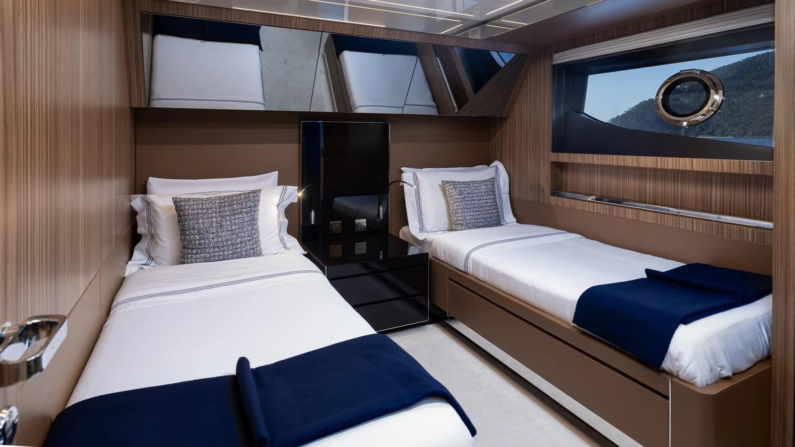 The twin stateroom offers a cozy and elegant retreat with modern furnishings and ample natural light. aboard M Yacht for Sale