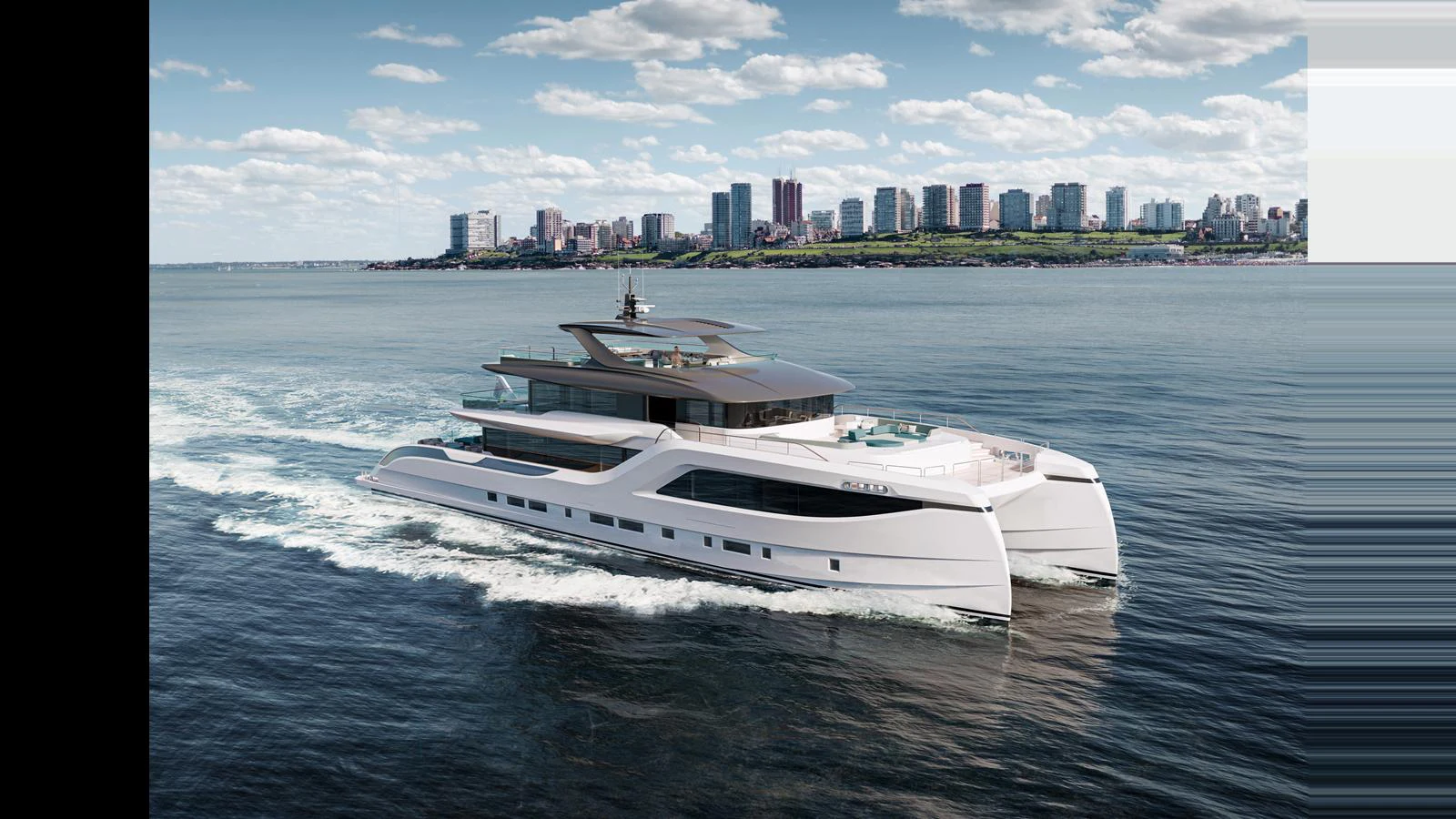 A sleek, modern catamaran yacht cruises through calm waters with a cityscape in the background. aboard GEMINI Yacht for Sale
