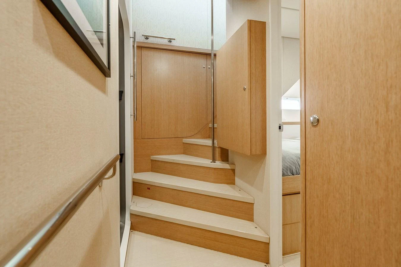 A cozy stairway leads to different sections of the yacht's interior. aboard UGLY BETTY Yacht for Sale