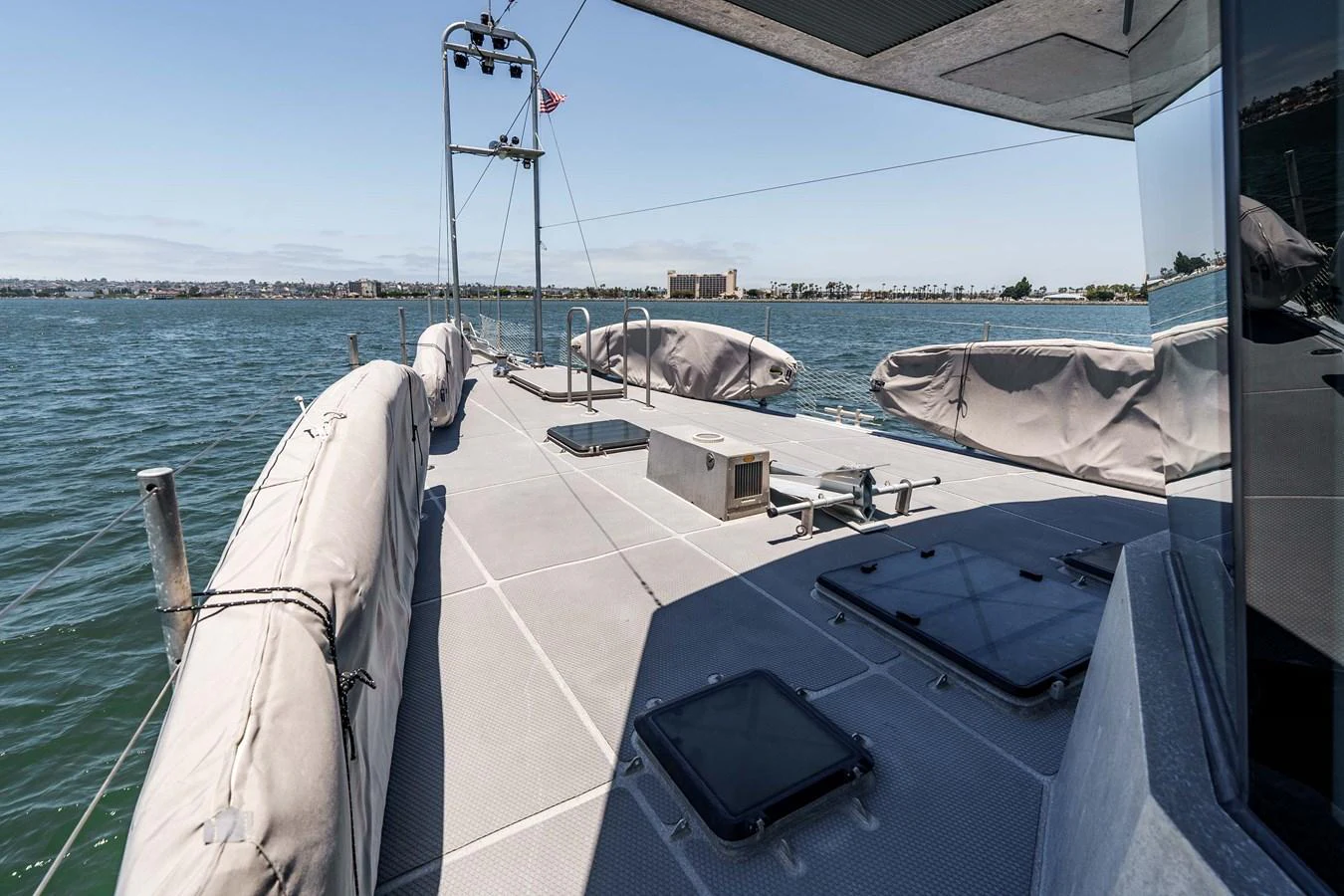 The yacht's deck offers a spacious and sleek area for relaxation and navigation. aboard UGLY BETTY Yacht for Sale