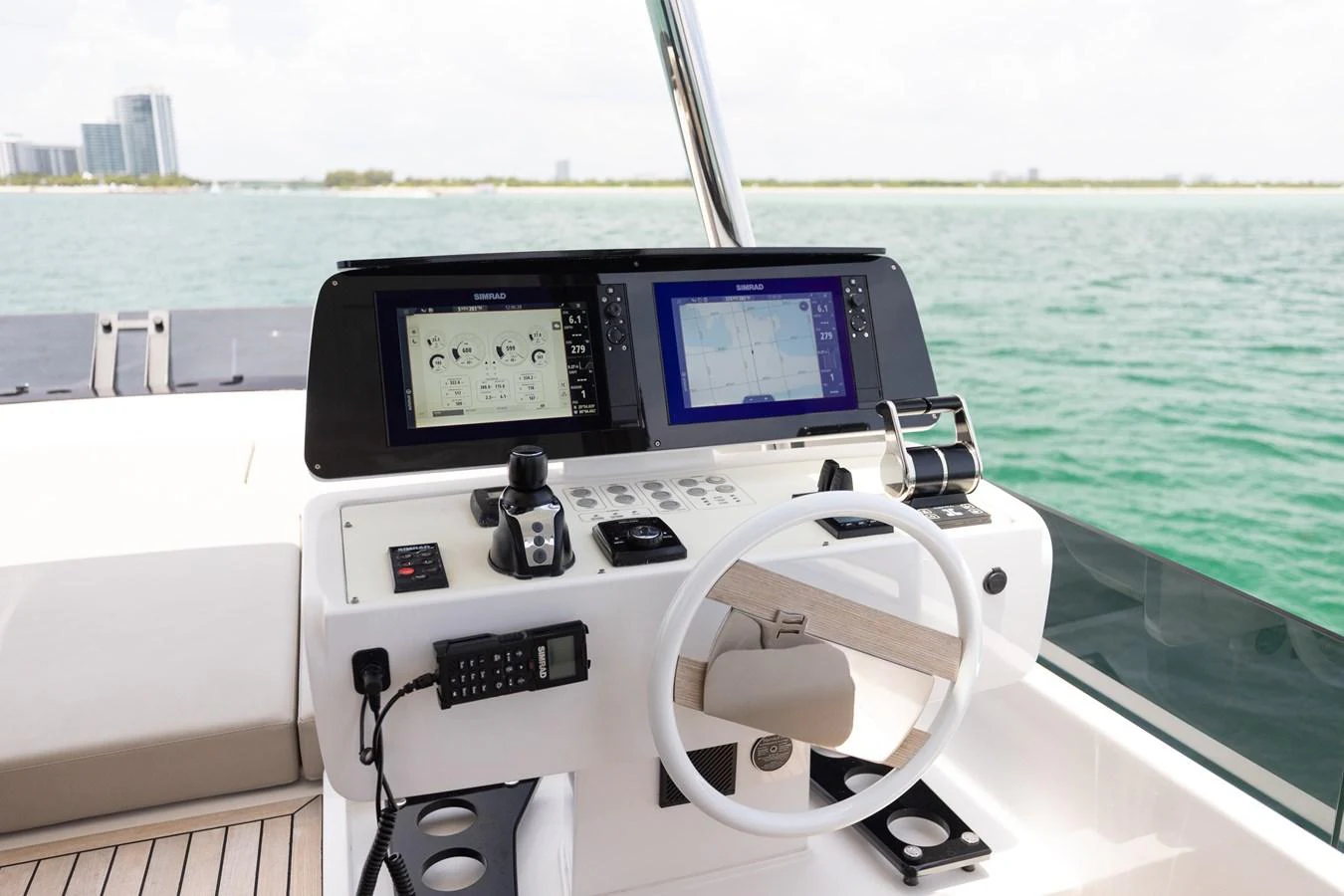 The helm station offers a modern and well-equipped control area with a scenic view of the water. aboard KATRIN I Yacht for Sale