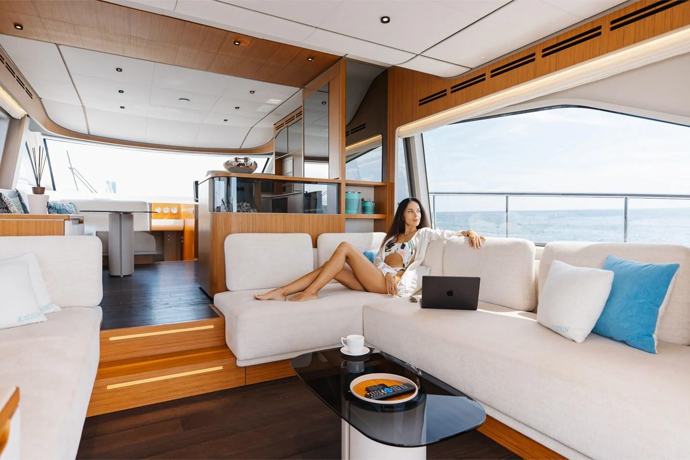 The salon offers a spacious and luxurious seating area with panoramic views. aboard KATRIN I Yacht for Sale