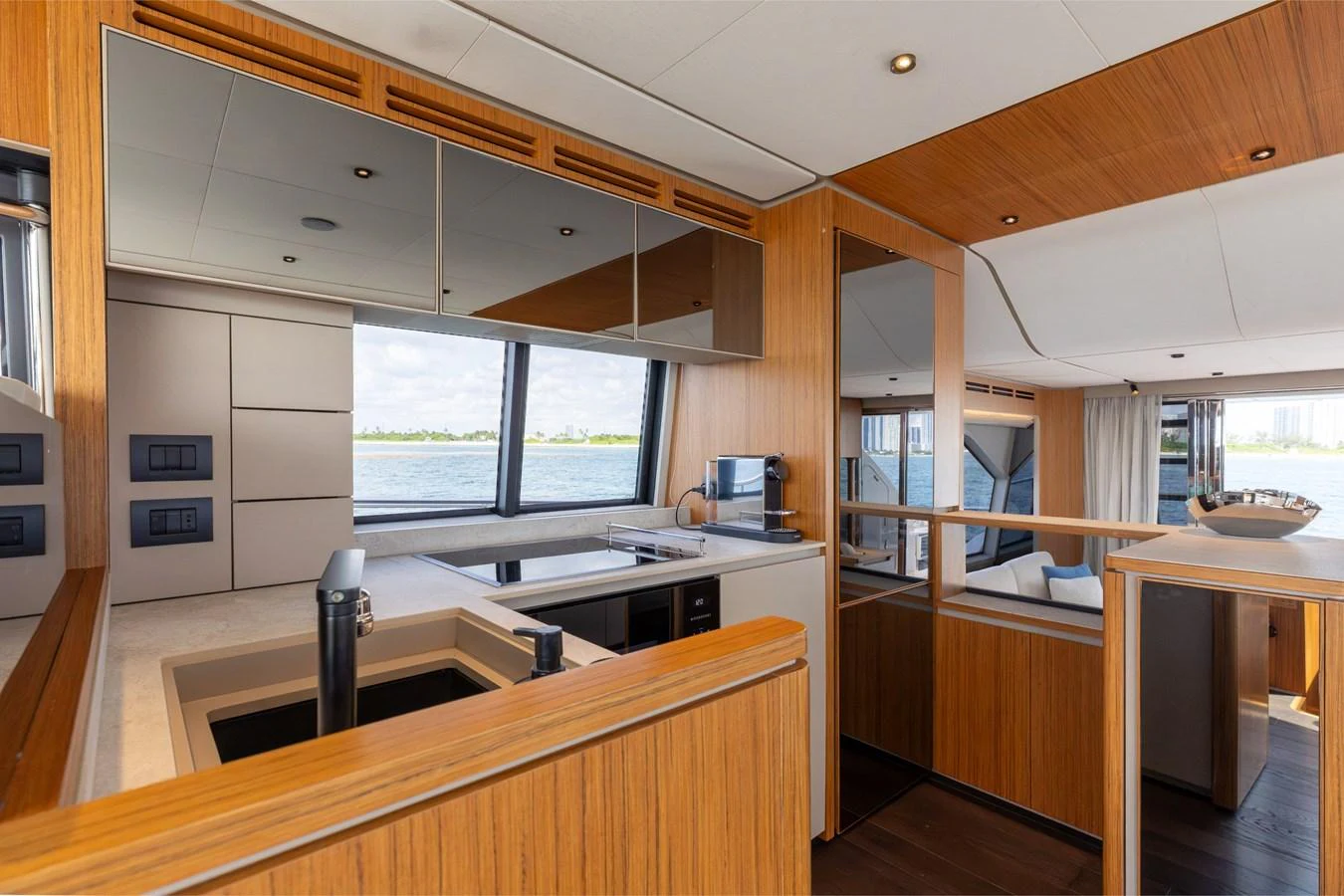 The galley features modern appliances and a sleek design with ample natural light. aboard KATRIN I Yacht for Sale