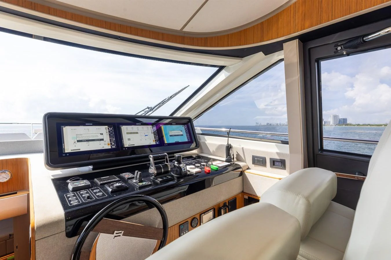 The helm station offers a modern and well-equipped control area with panoramic views. aboard KATRIN I Yacht for Sale