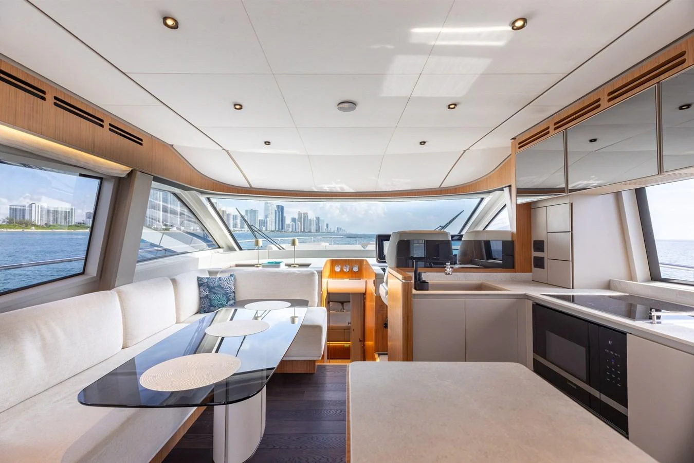 The salon offers a spacious and modern living area with panoramic views and luxurious furnishings. aboard KATRIN I Yacht for Sale