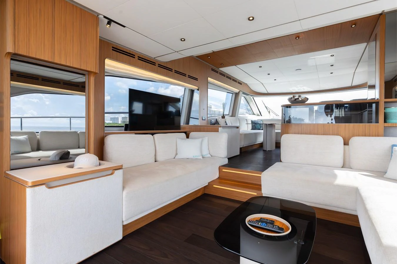 The salon features a spacious and modern design with ample seating and natural light. aboard KATRIN I Yacht for Sale