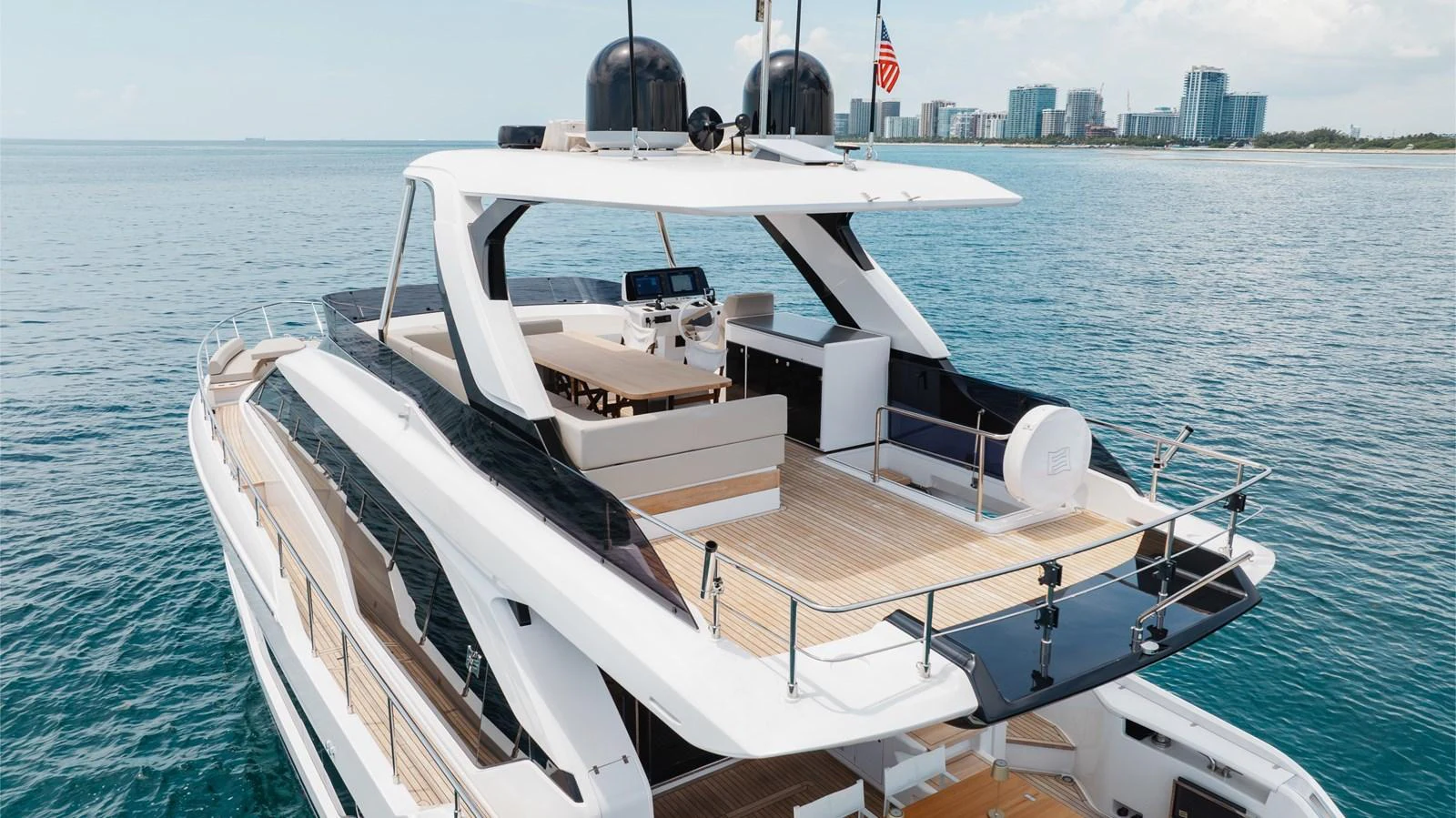The yacht's flybridge offers a spacious and luxurious outdoor area with ample seating and stunning views. aboard KATRIN I Yacht for Sale
