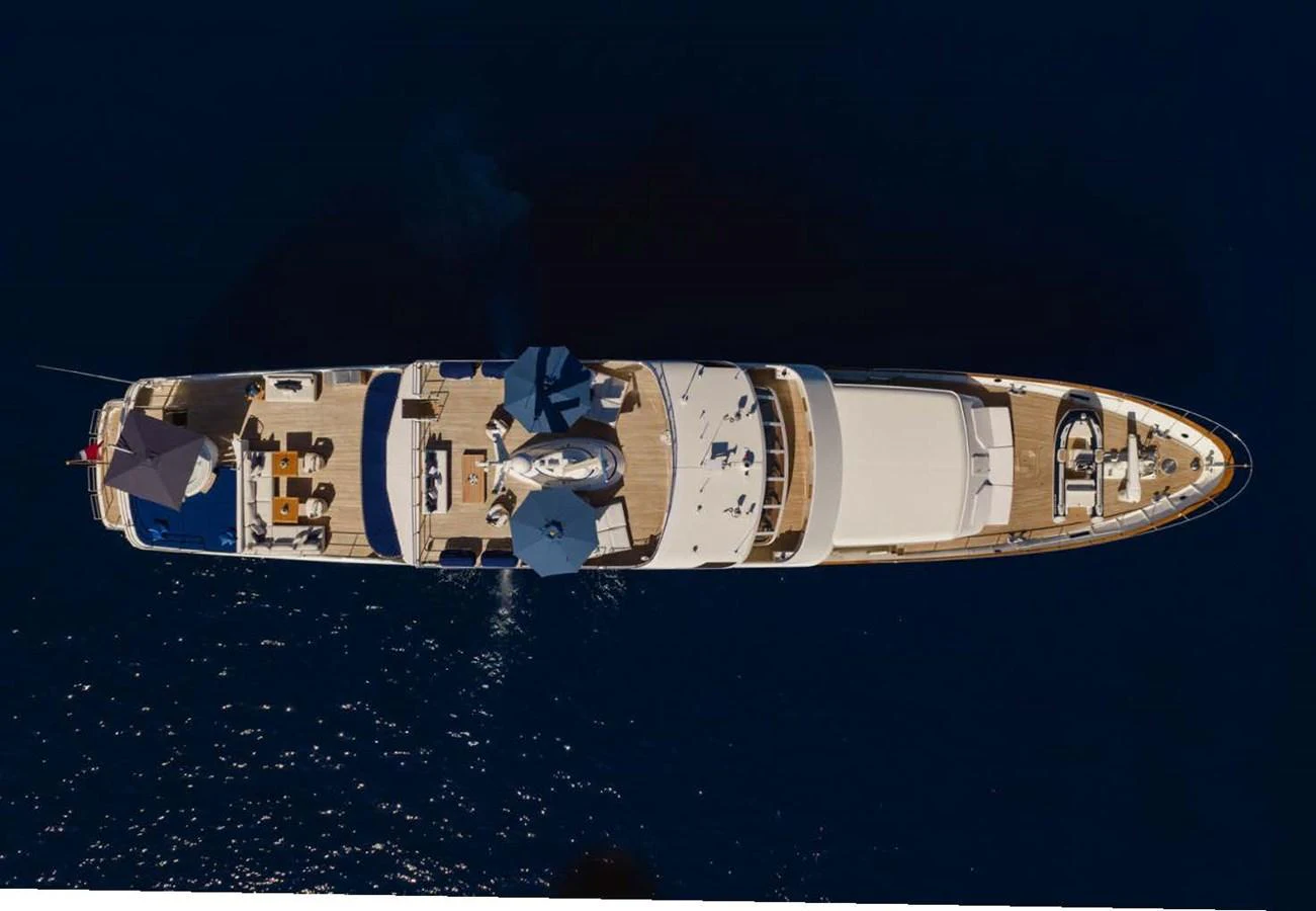 A stunning aerial view of a luxurious yacht showcasing its spacious decks and elegant design. aboard PANACHE Yacht for Sale