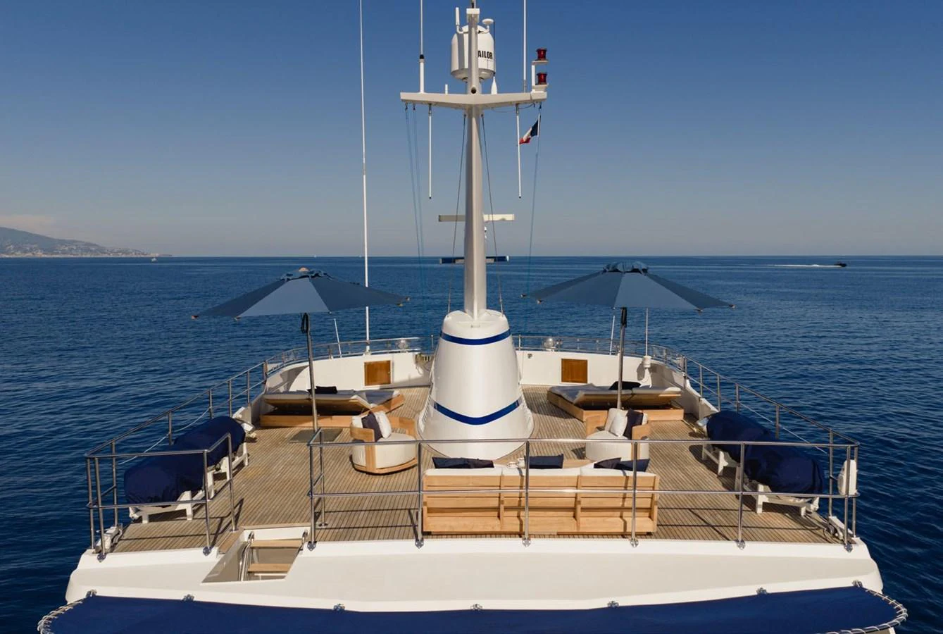 The sundeck offers a spacious and inviting area for relaxation with ample seating and shade. aboard PANACHE Yacht for Sale