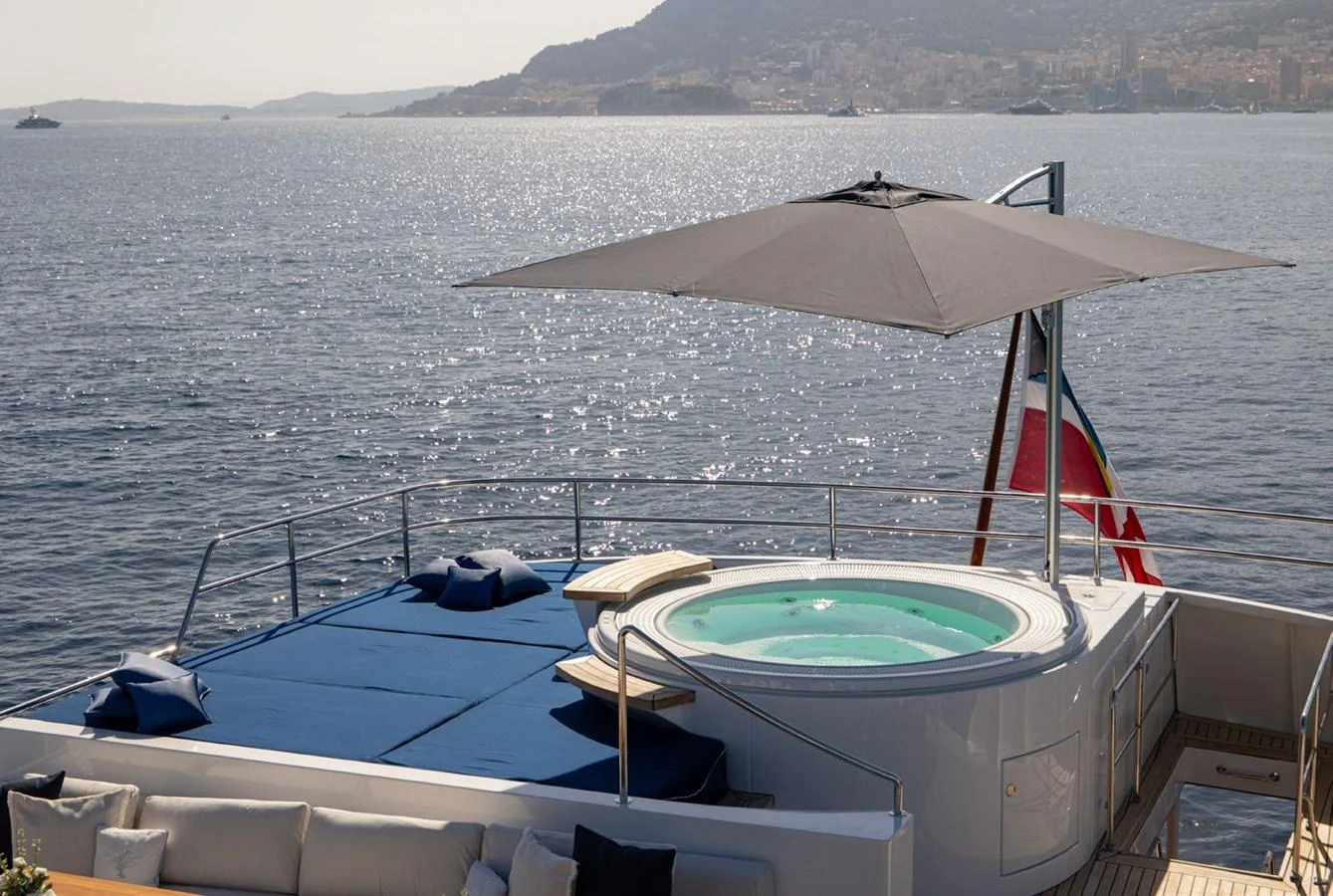The sundeck features a luxurious jacuzzi with a stunning sea view, perfect for relaxation. aboard PANACHE Yacht for Sale