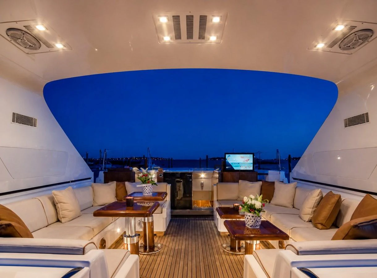 The aft deck offers a luxurious and inviting space with plush seating and elegant lighting, perfect for evening relaxation. aboard ANGELINA Yacht for Sale