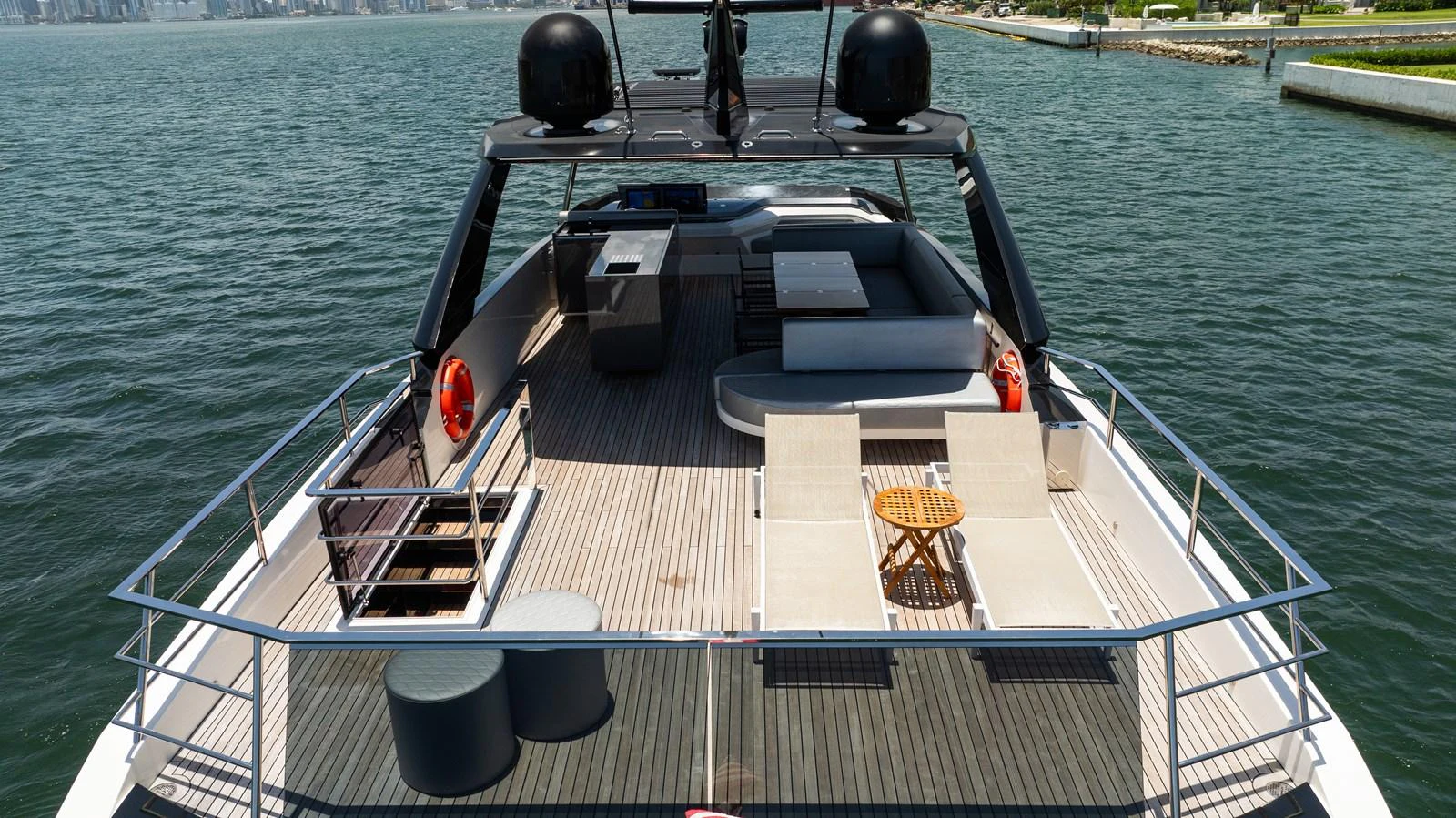 The yacht's flybridge offers ample seating and lounging areas with stunning views of the water. aboard HOTEL COLLECTION Yacht for Sale