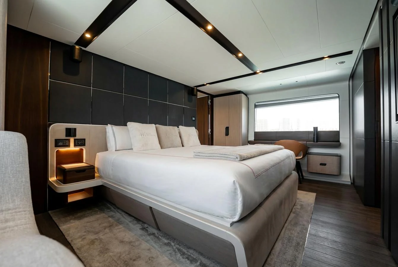 The master stateroom offers a luxurious and spacious sleeping area with modern design elements. aboard HOTEL COLLECTION Yacht for Sale