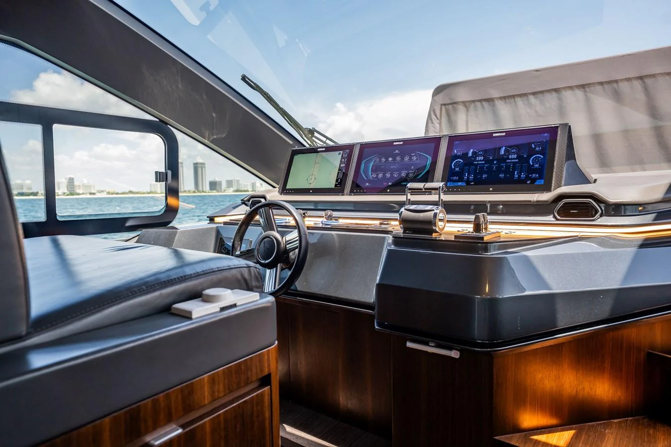 The helm station features advanced navigation equipment and luxurious finishes. aboard HOTEL COLLECTION Yacht for Sale