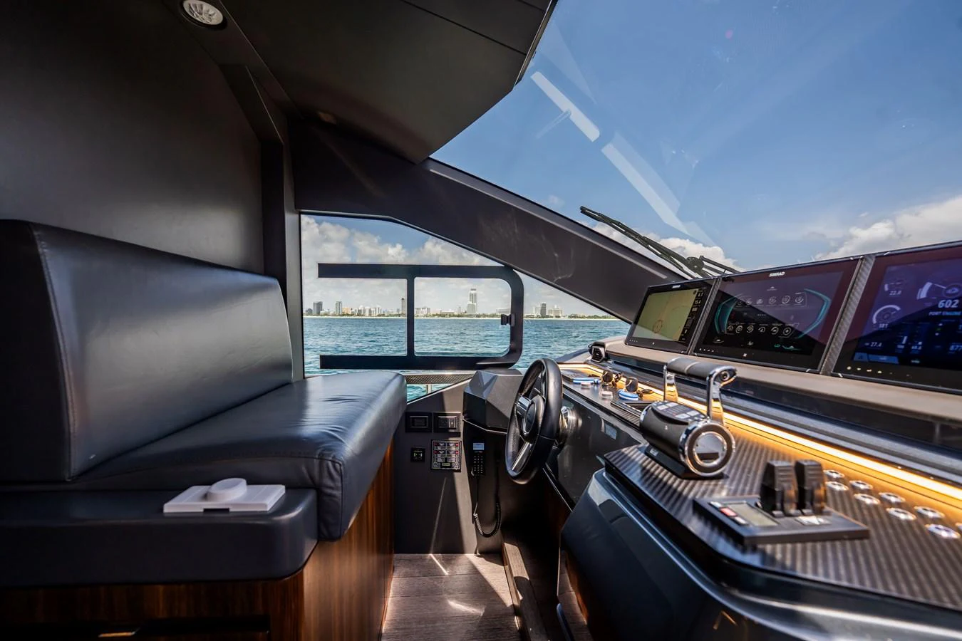 The helm of this yacht offers a sleek and modern design with advanced navigation equipment and a comfortable seating area. aboard HOTEL COLLECTION Yacht for Sale