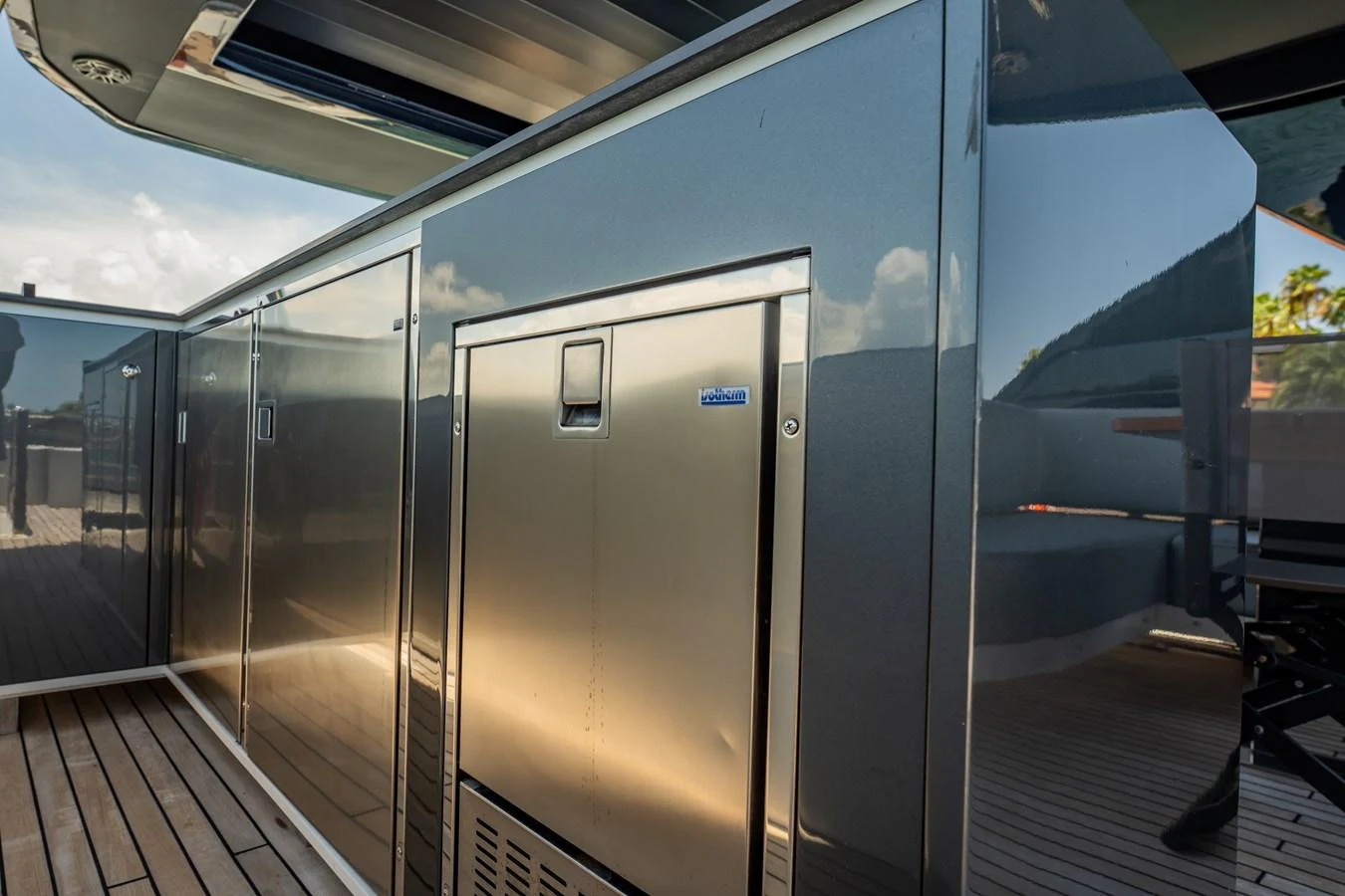 A sleek stainless steel outdoor kitchen area on the yacht's deck. aboard HOTEL COLLECTION Yacht for Sale