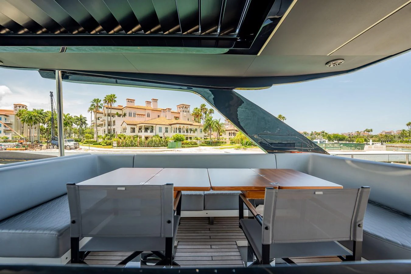 The aft deck offers a spacious and comfortable dining area with a scenic view. aboard HOTEL COLLECTION Yacht for Sale