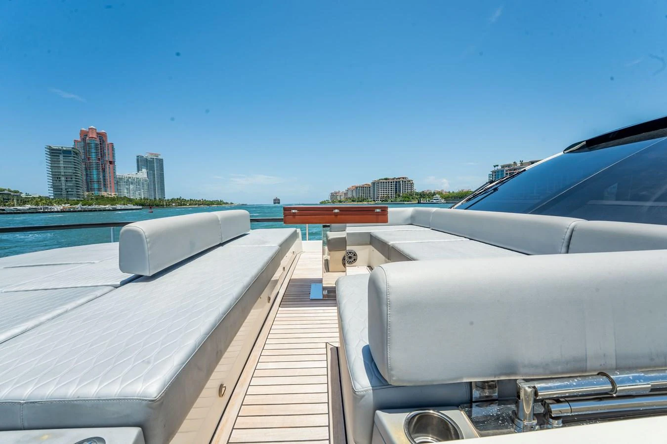 The aft deck offers a spacious and comfortable lounging area with stunning waterfront views. aboard HOTEL COLLECTION Yacht for Sale