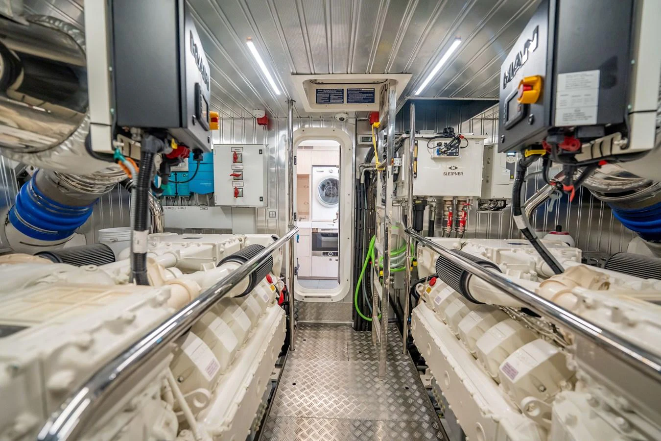 The engine room showcases powerful machinery and a well-organized layout. aboard HOTEL COLLECTION Yacht for Sale