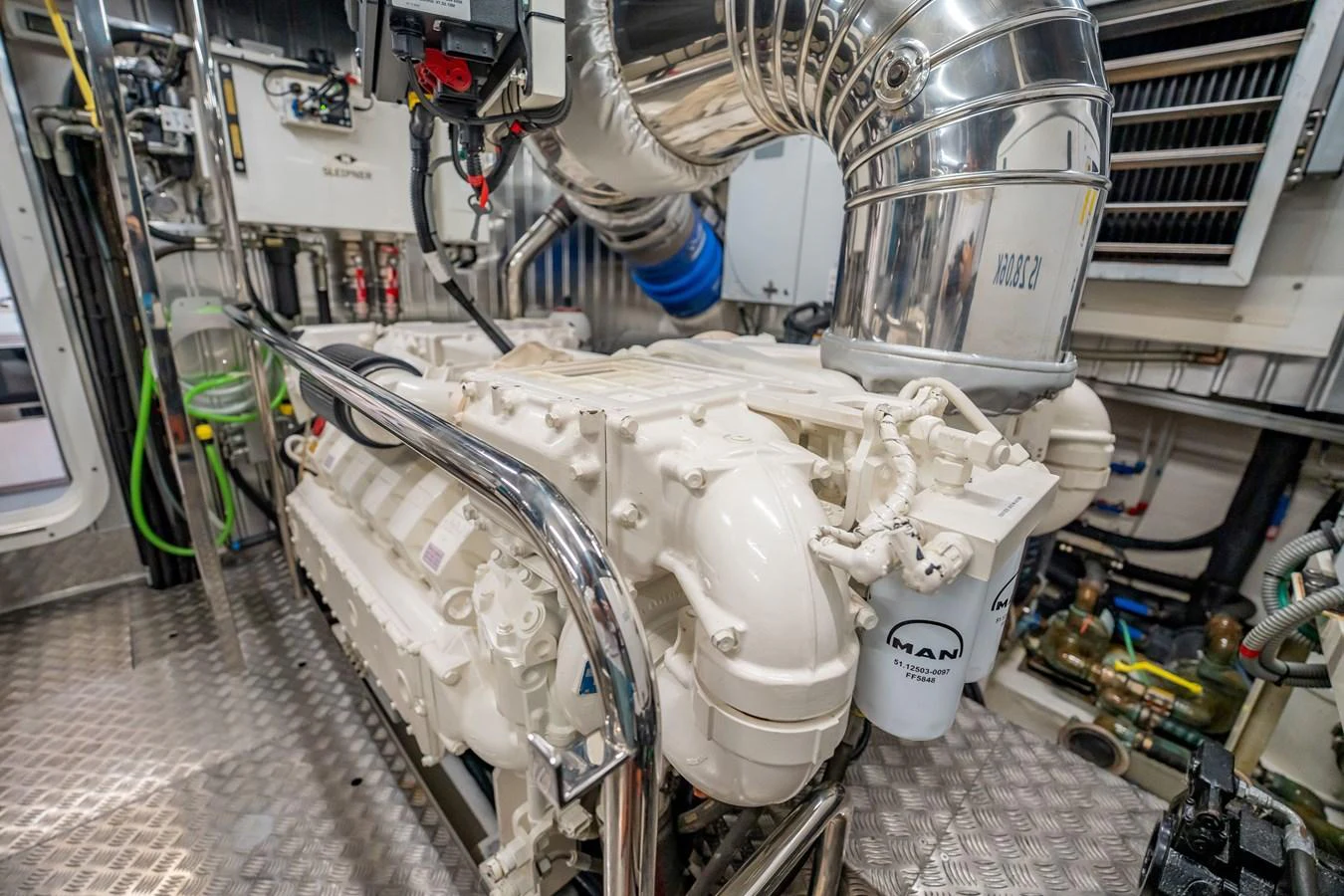 The engine room showcases the powerful and meticulously maintained machinery of the yacht. aboard HOTEL COLLECTION Yacht for Sale