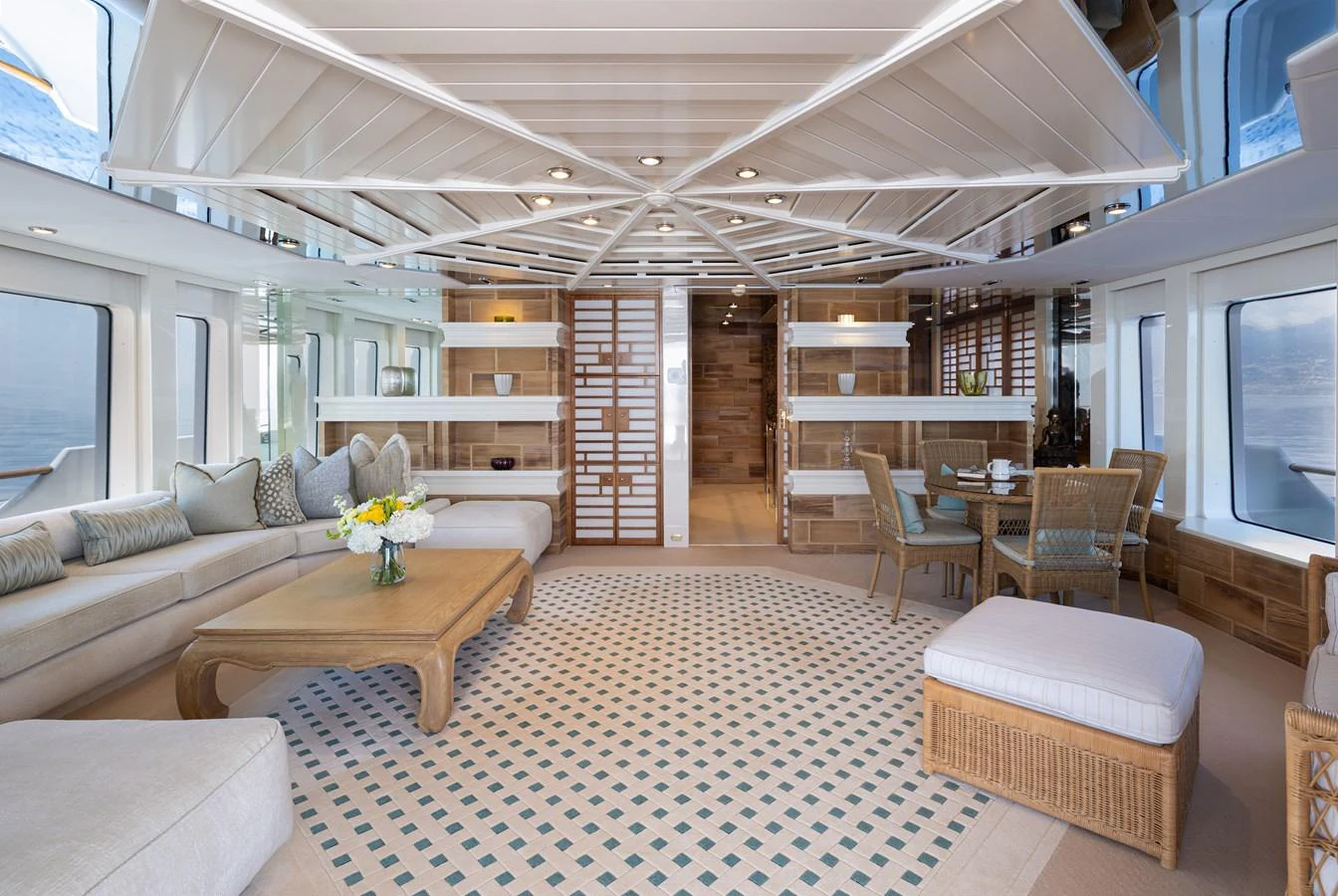 The spacious salon features elegant furnishings and ample natural light, creating a welcoming and luxurious atmosphere. aboard MY LADY Yacht for Sale