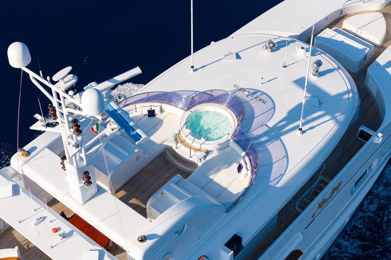 The sundeck features a luxurious jacuzzi surrounded by ample lounging space, perfect for relaxation. aboard MY LADY Yacht for Sale