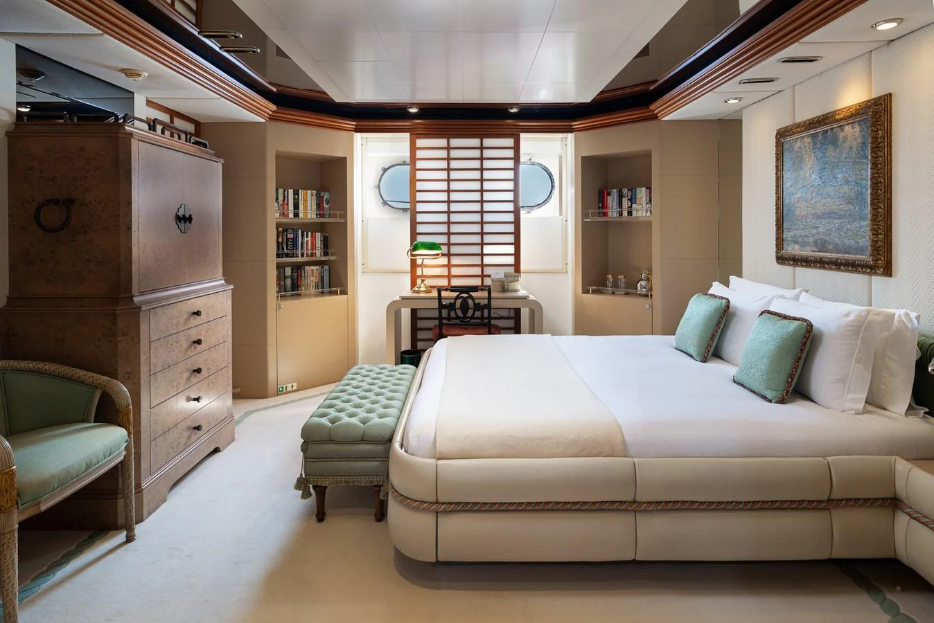 The master stateroom features a luxurious bed, elegant furnishings, and ample natural light. aboard MY LADY Yacht for Sale