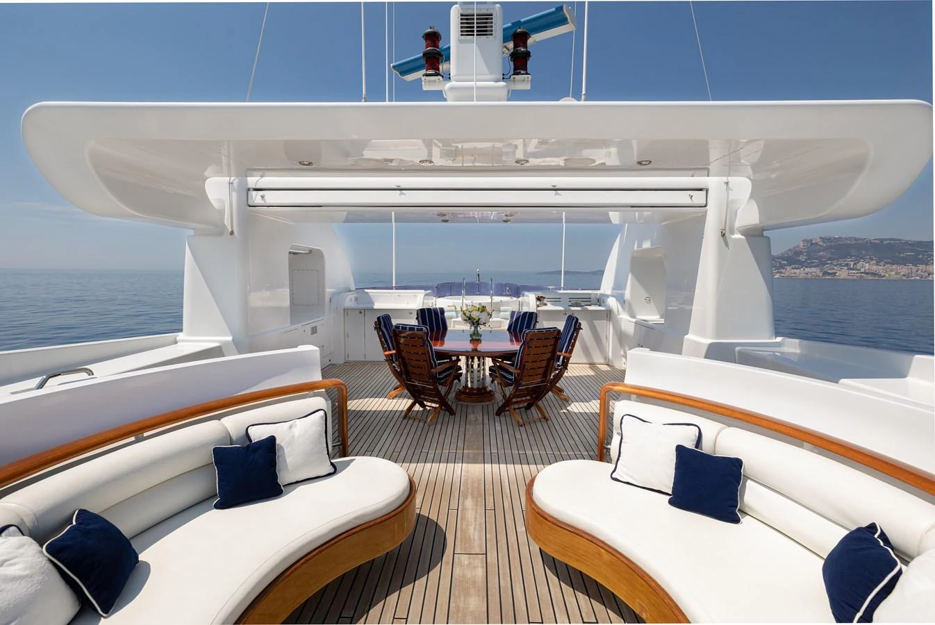 The sundeck offers a luxurious outdoor dining and lounging area with stunning sea views. aboard MY LADY Yacht for Sale