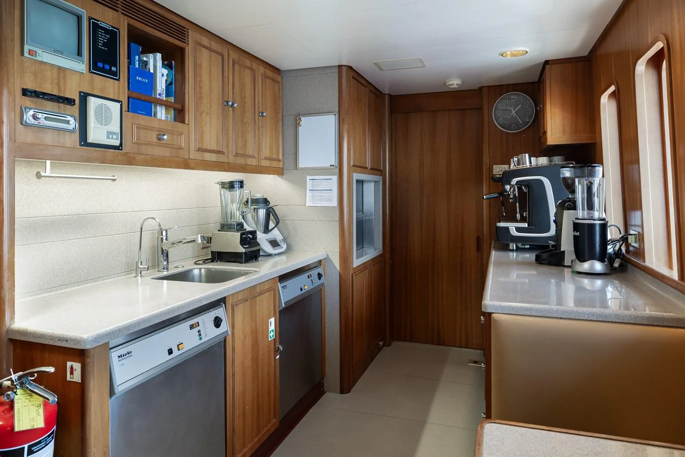 The galley is equipped with modern appliances and ample counter space for meal preparation. aboard MY LADY Yacht for Sale