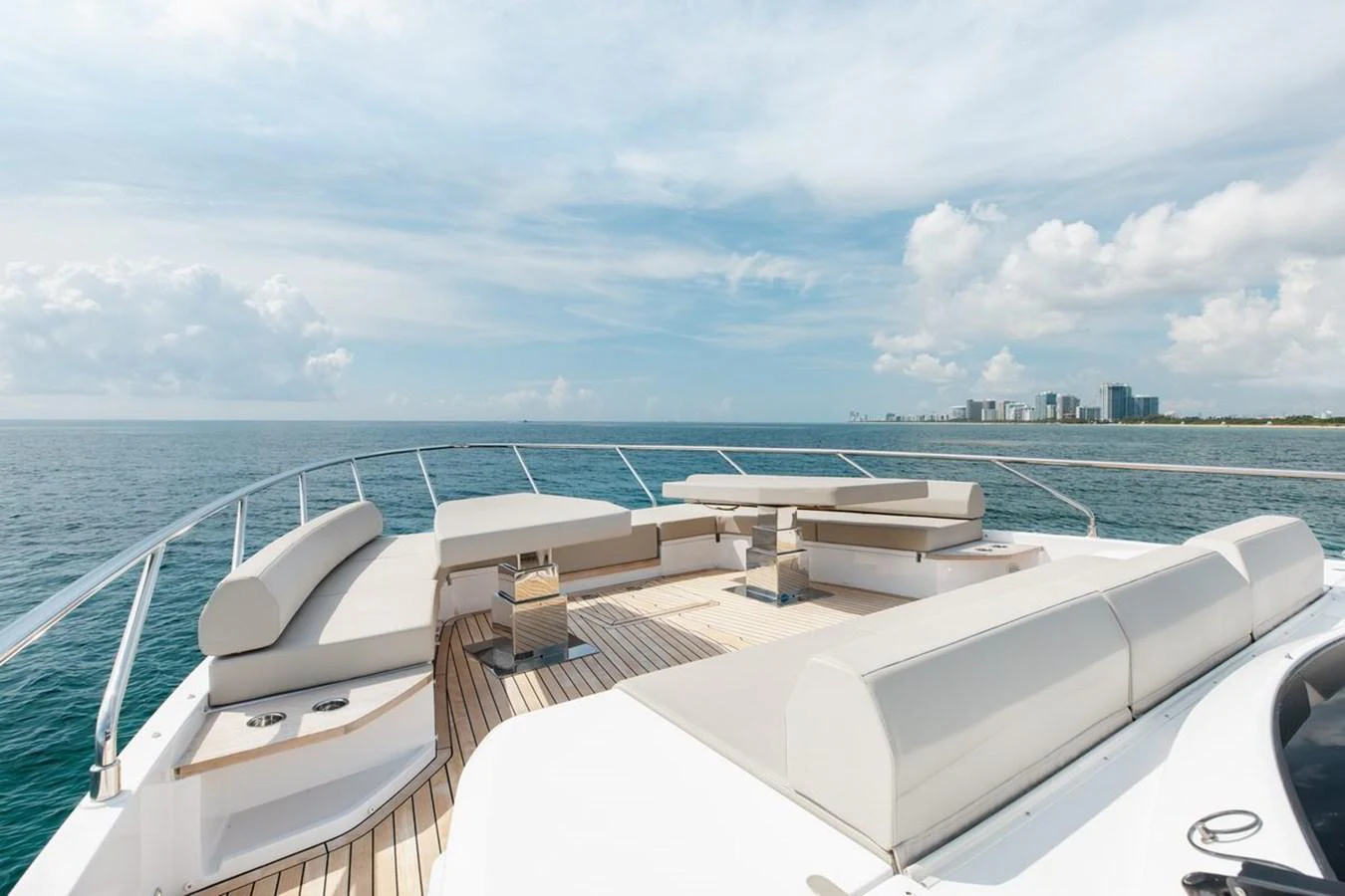 The yacht features a spacious and luxurious bow seating area with panoramic ocean views. aboard 2025 FERRETTI 670 KATRIN I Yacht for Sale