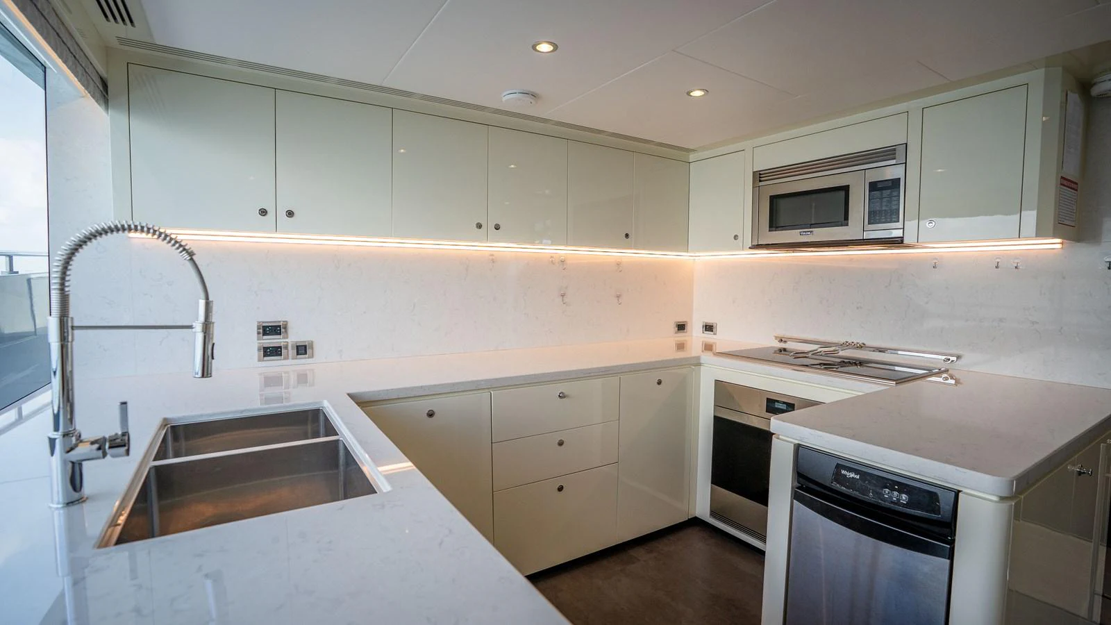 The yacht's galley features modern appliances and sleek cabinetry, offering a stylish and functional space for meal preparation. aboard COOL CHANGE Yacht for Sale