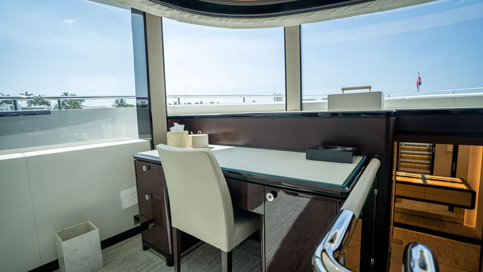 The helm station features a sleek, modern design with panoramic views. aboard COOL CHANGE Yacht for Sale