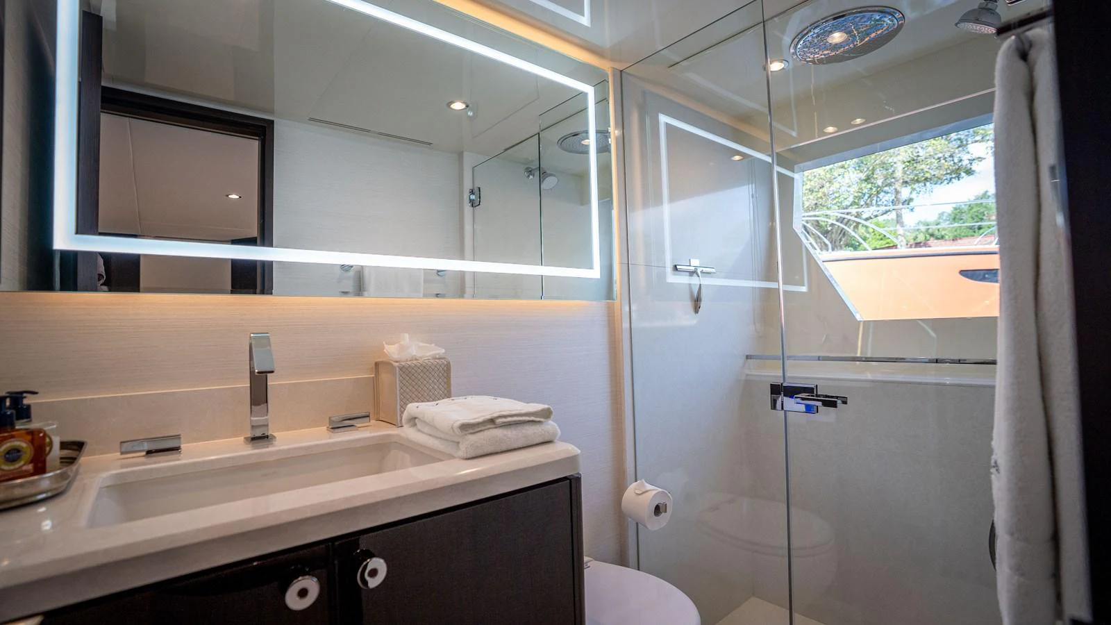 The yacht's bathroom features modern fixtures and a sleek design. aboard COOL CHANGE Yacht for Sale