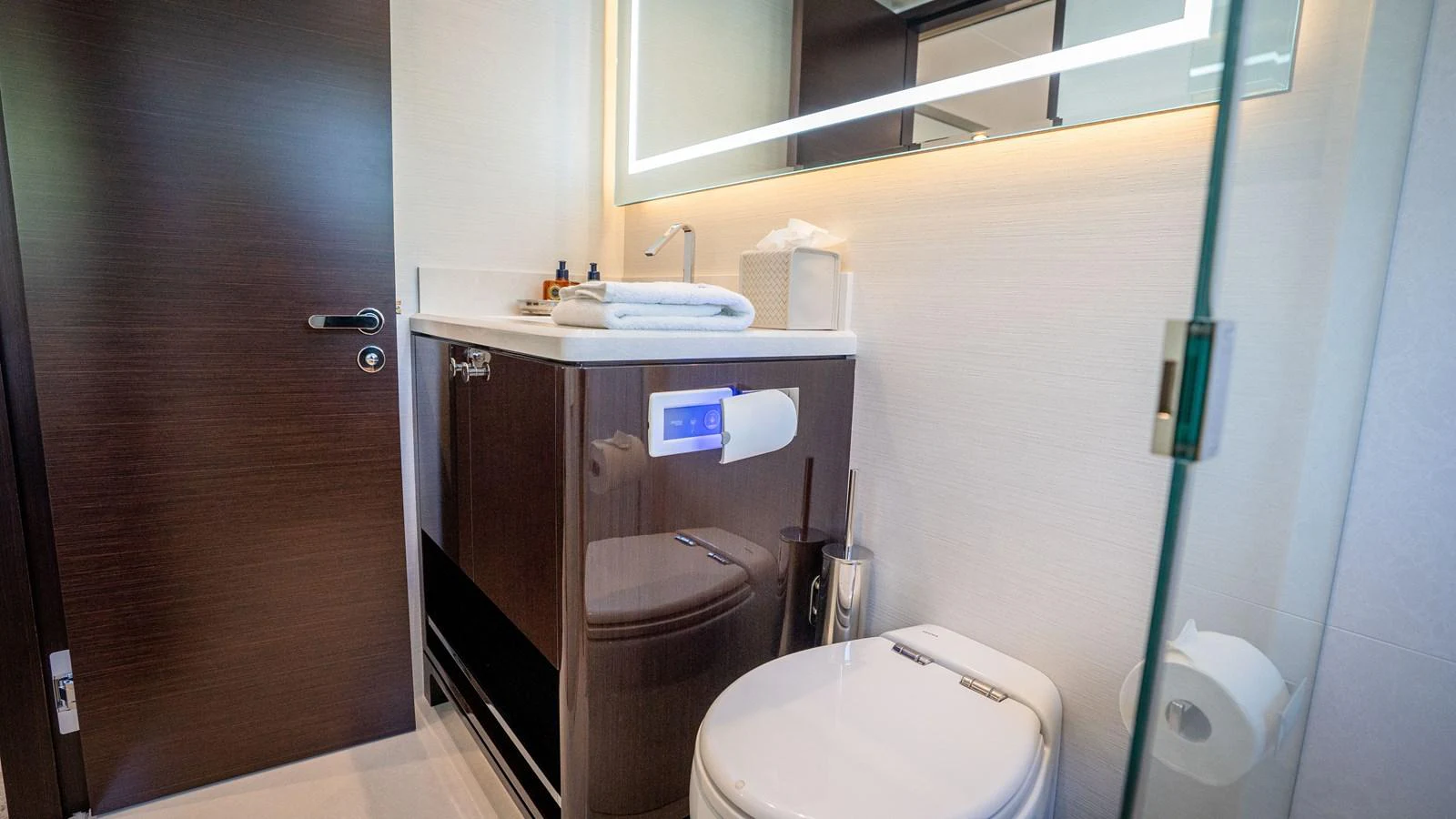 The yacht's bathroom features modern fixtures and a sleek design. aboard COOL CHANGE Yacht for Sale