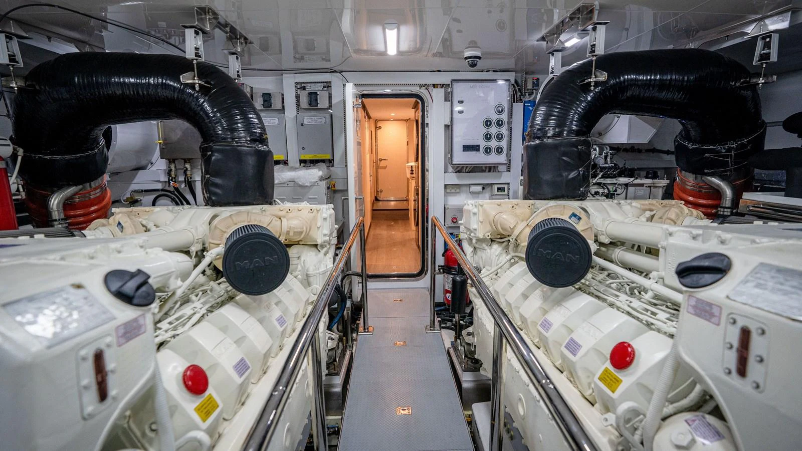 The engine room showcases powerful machinery and a well-organized layout. aboard COOL CHANGE Yacht for Sale