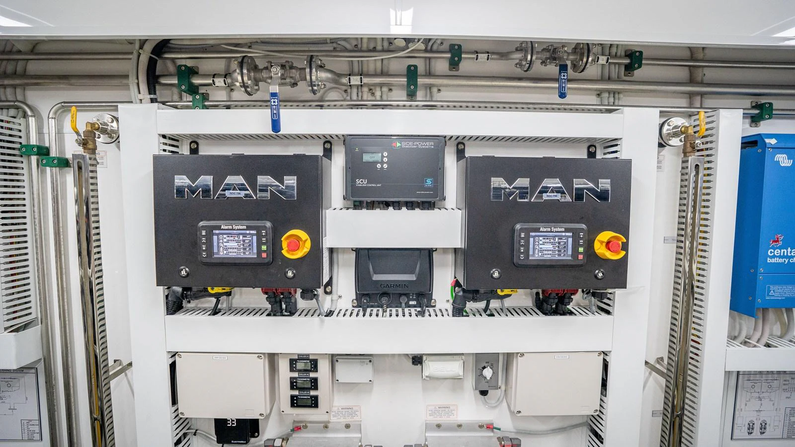 The image showcases the engine room with advanced machinery and control systems. aboard COOL CHANGE Yacht for Sale