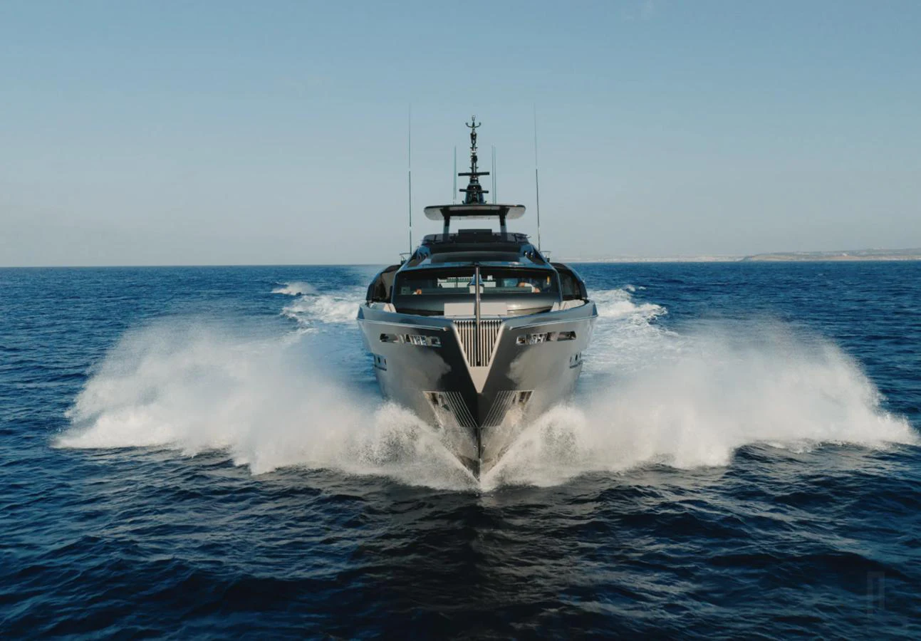A sleek yacht cuts through the water, showcasing its powerful design and modern lines. aboard BYEEE... Yacht for Sale