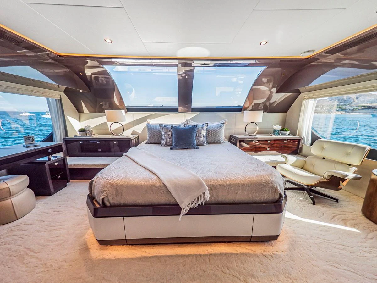 The master stateroom offers a luxurious and spacious retreat with panoramic views of the sea. aboard LONE STAR Yacht for Sale