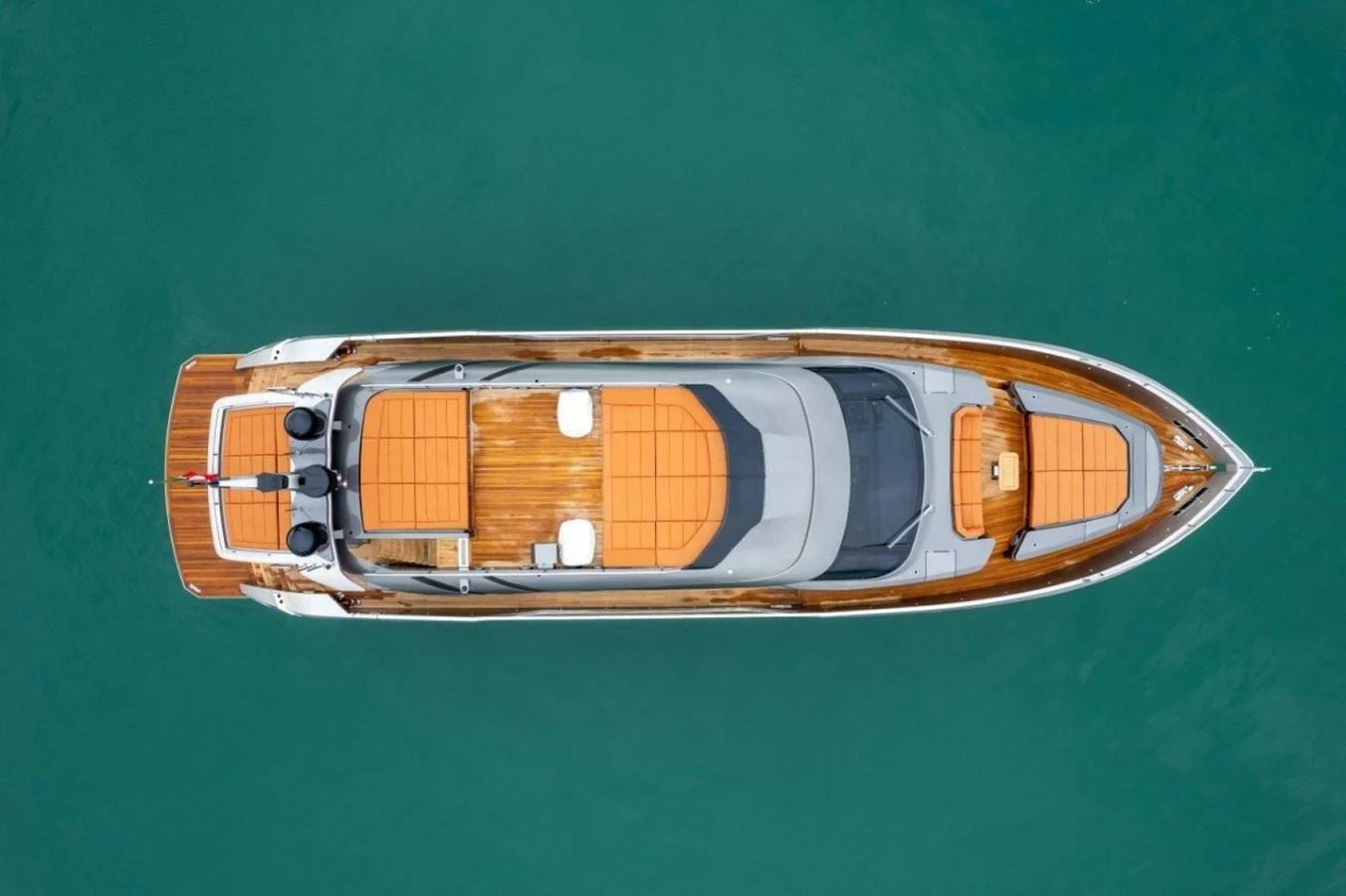 Aerial view of a sleek yacht showcasing its elegant design and spacious deck areas. aboard AB 100/05 Yacht for Sale