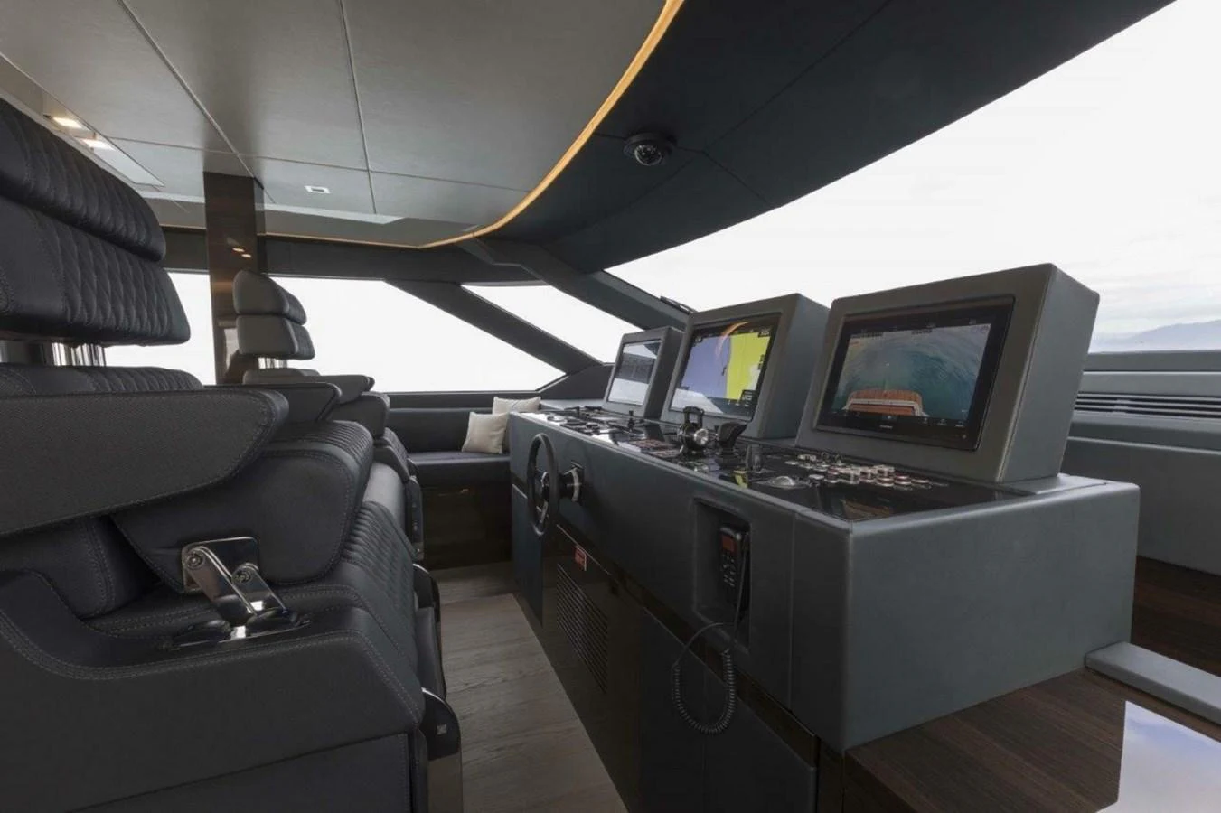 The helm station features advanced navigation equipment and luxurious seating. aboard AB 100/05 Yacht for Sale