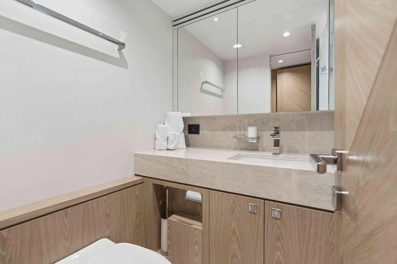 The yacht's bathroom features modern fixtures and a sleek design. aboard THE ROCK Yacht for Sale