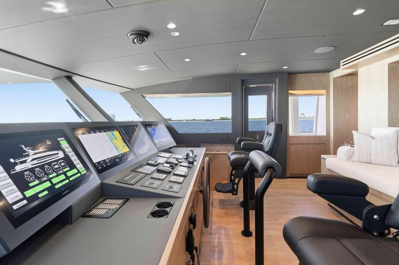 The helm station features state-of-the-art navigation equipment and comfortable seating with a panoramic view of the sea. aboard THE ROCK Yacht for Sale