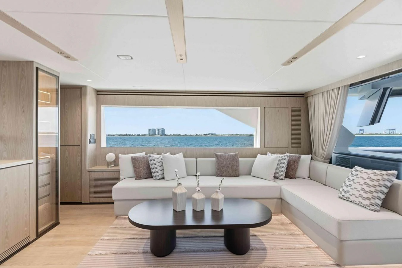 The salon offers a spacious and elegantly designed seating area with panoramic views of the sea. aboard THE ROCK Yacht for Sale